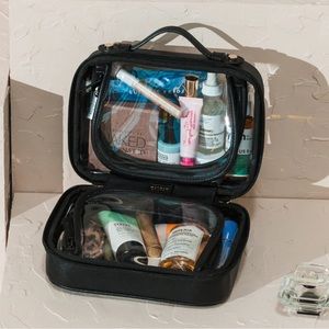 NWT Calpak Small Clear Cosmetics Case (Black)